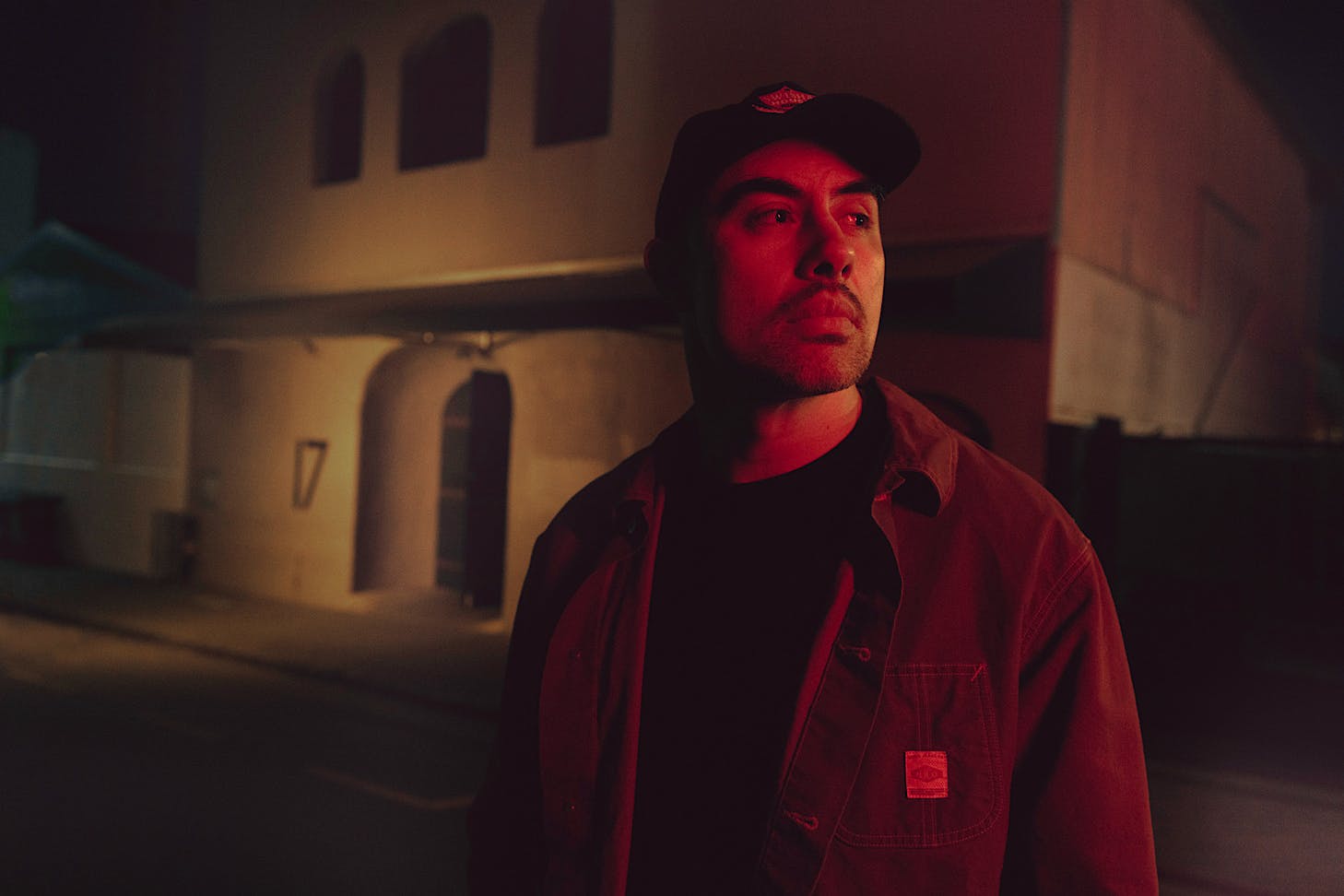 David Dallas in red light outside Galatos.